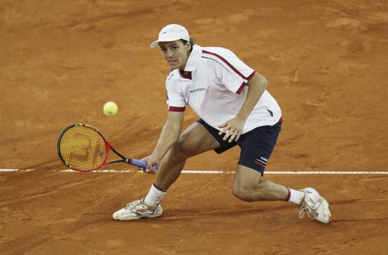 HAMBURG, GERMANY - MAY 17:  Gaston Gaudio of Argentina hits a forehand during his semi-final defeat against Guillermo Coria of Argentina at the Hamburg Masters Series at the Rothenbaum Tennis Centre on May 17, 2003 in Hamburg, Germany.  (Photo by Michael Steele/Getty Images)