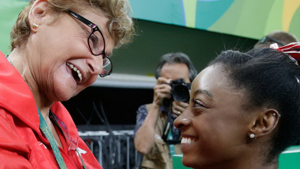 martha-karolyi-simone-biles-smile_ap