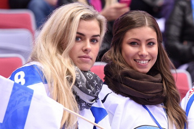 Finland's fans pose before the Men's ice hockey Bronze Medal Game USA vs Finland at the Bolshoy Ice Dome during the Sochi Winter Olympics on February 22, 2014. AFP PHOTO / ANDREJ ISAKOVIC (Photo credit should read ANDREJ ISAKOVIC/AFP/Getty Images)