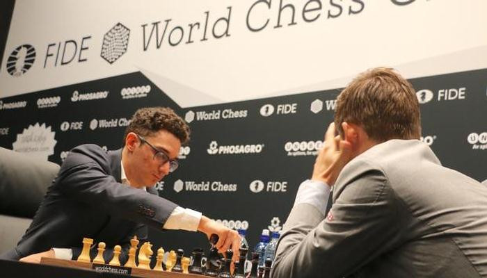Карлсен сыграл вничью с Каруаной в четвертой партии матча за звание чемпиона мира - Шахматы